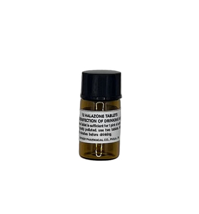 Small brown bottle with a black cap on a light gray background