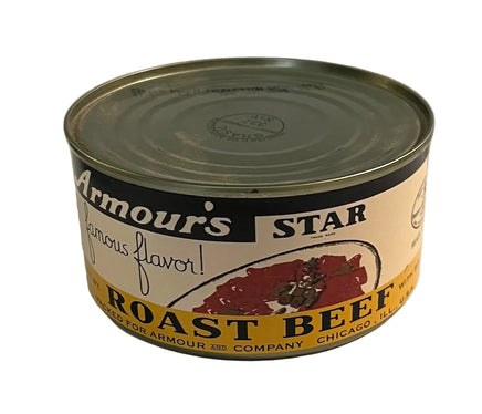 A vintage can of Armour's Star Roast Beef on a plain light background. The can features a cream-colored label with black text, a yellow band, and an illustration of red roast beef.
