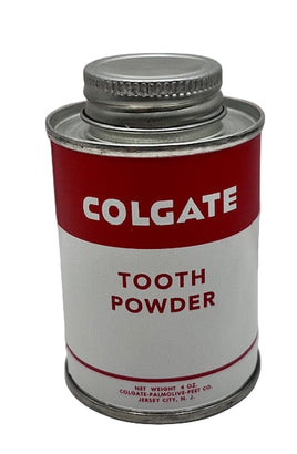 Colgate tooth powder canister on a white background