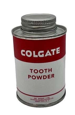 Colgate tooth powder canister on a white background