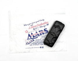 Black candy bar with Mars branding on a white background