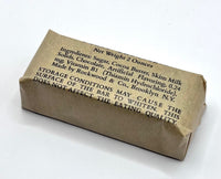 Kraft paper-wrapped chocolate bar with text on a white background