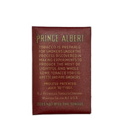 Prince Albert tobacco packaging with text on a white background