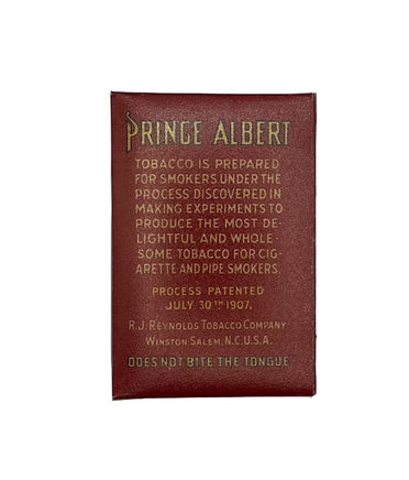 Prince Albert tobacco packaging with text on a white background