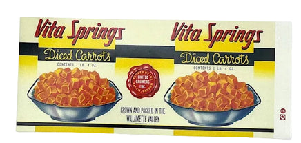 A vintage-style Vita Springs Diced Carrots box front shown flat against a white background. The packaging features two bowls of orange-red diced carrots, red script branding, black horizontal bands, and yellow sections.