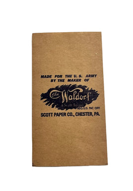 Brown paper bag with black text and logo on a gray background