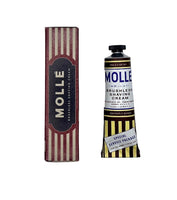 Molle shaving cream tube and packaging on a white background